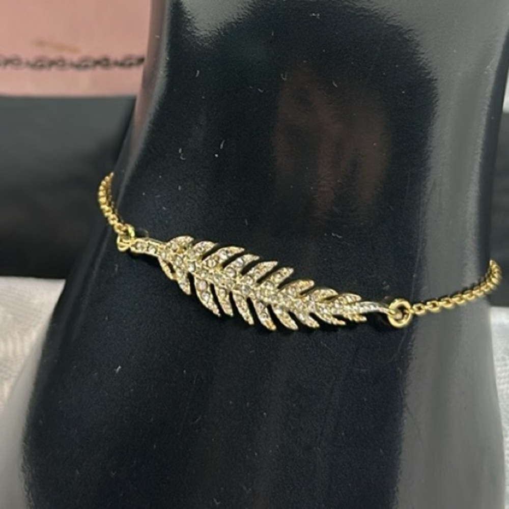 Juicy Couture Bracelet leaf feather dainty gold diamonds